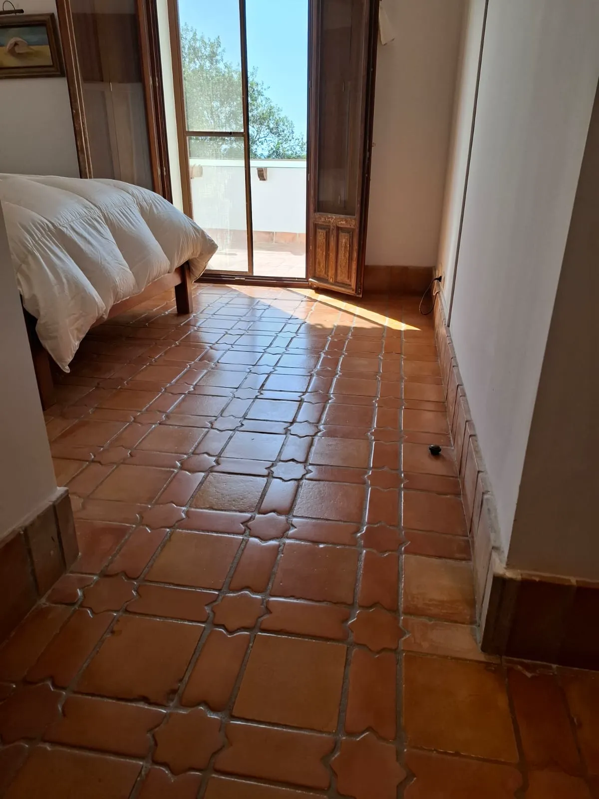 Después — Tratamiento de barro cocido en dormitorio